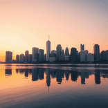 Vibrant sunset cityscape with high-rise silhouettes mirrored in gentle waterfront.
